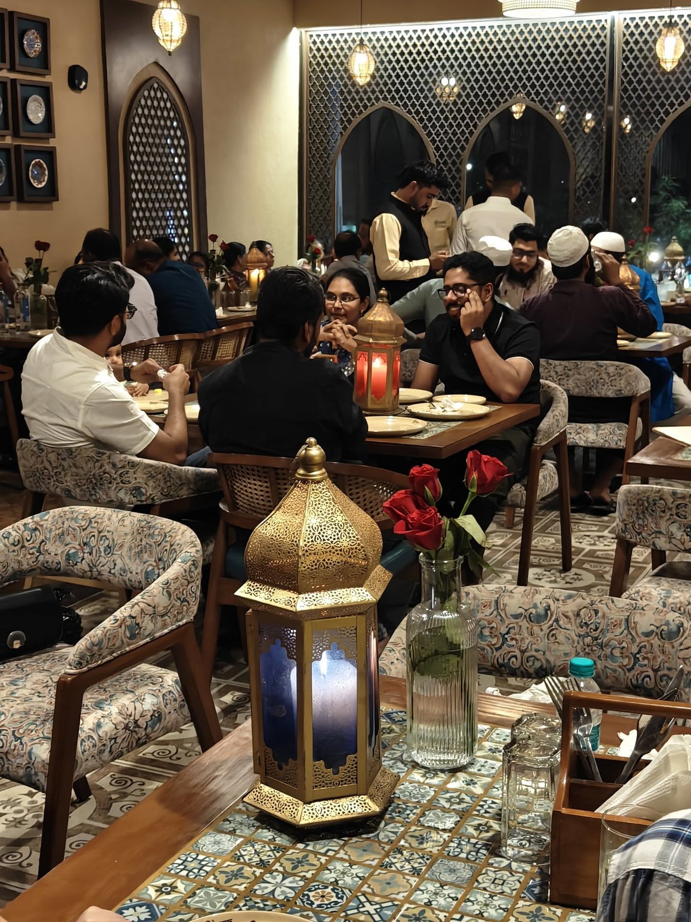 Evening dining with brass lanterns