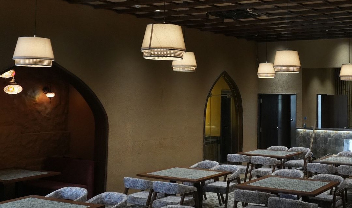 Qissa Multi Cuisine Restaurant dining hall in Vishala, Ahmedabad